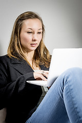 Image showing woman on sofa with laptop