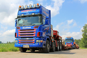 Image showing Two Scania V8 Trucks with Drop Deck Trailer