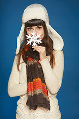 Image showing Winter happy people - woman with snowflake