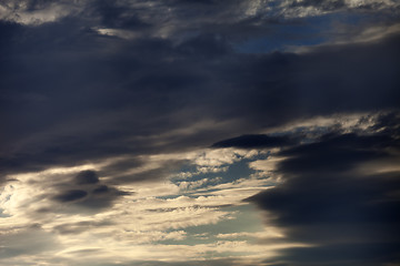 Image showing Dark sunset sky with clouds