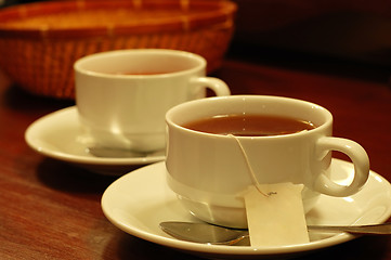 Image showing Cups and basket