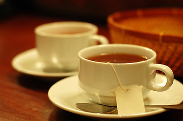 Image showing Cups and basket