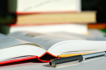 Image showing Books and pen