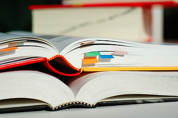 Image showing Two books opened and stacked