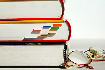Image showing Three books and glasses