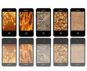 Image showing Modern mobile phones with different textures