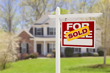 Image showing Sold Home For Sale Sign in Front of New House