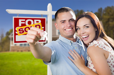 Image showing Military Couple In Front of Home, House Keys and Sign