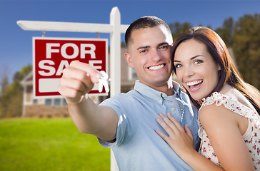 Image showing Military Couple In Front of Home, House Keys and Sign