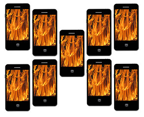 Image showing mobile phone with flame on the white background