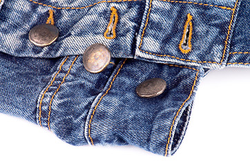 Image showing Buttons on Blue Jeans