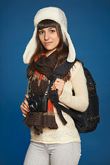 Image showing Winter woman with photocamera