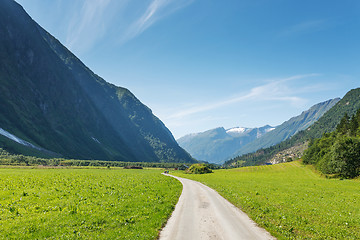 Image showing Dirt road passing in a valley