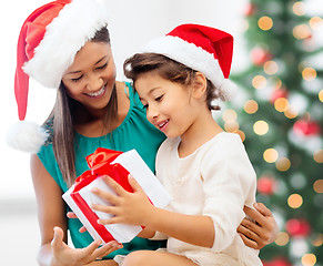 Image showing happy mother and child girl with gift box