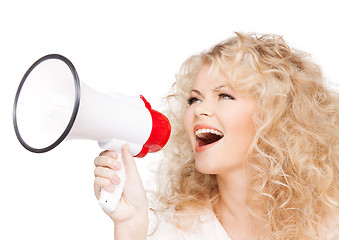 Image showing woman with long curly hair holding megaphone