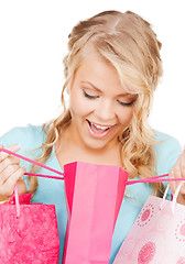 Image showing picture of happy woman with shopping bags