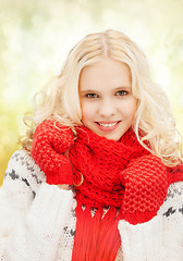 Image showing teenage girl in red mittens and scarf