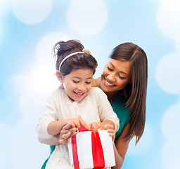 Image showing happy mother and child girl with gift box