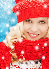 Image showing teenage girl in red hat and scarf