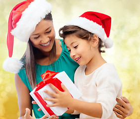 Image showing happy mother and child girl with gift box