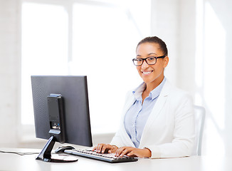 Image showing african businesswoman with computer in office