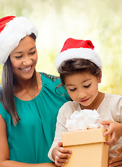 Image showing happy mother and child girl with gift box