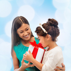 Image showing happy mother and child girl with gift box