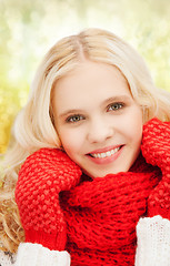 Image showing teenage girl in red mittens and scarf