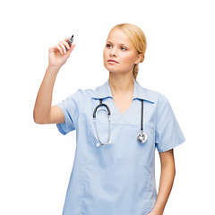 Image showing doctor or nurse working with something imaginary