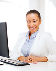 Image showing african businesswoman with computer in office