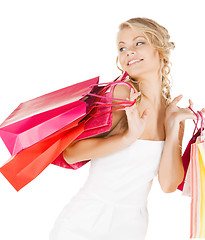 Image showing picture of happy woman with shopping bags