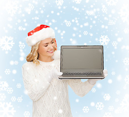 Image showing woman in santa helper hat with laptop computer