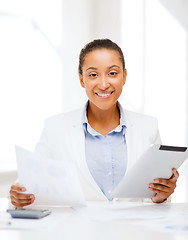 Image showing businesswoman with tablet pc in office