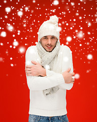 Image showing man in warm sweater, hat and scarf