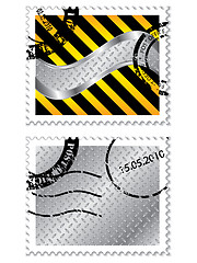 Image showing Metallic stamps with warning design 