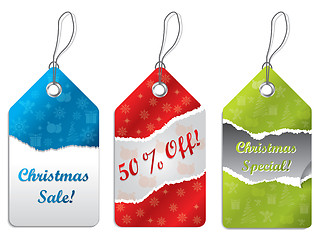 Image showing Torn christmas labels