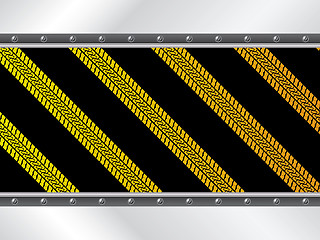 Image showing Yellow tire tracks on black background