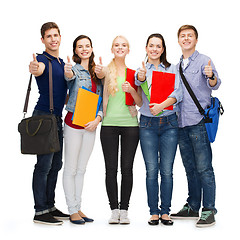 Image showing group of smiling students showing thumbs up