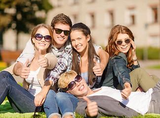 Image showing group of students or teenagers showing thumbs up