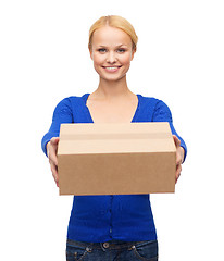 Image showing smiling woman in casual clothes with parcel box