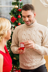 Image showing romantic man proposing to a woman