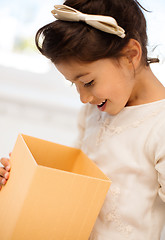 Image showing happy child with gift box