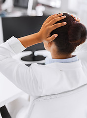 Image showing stressed woman with computer