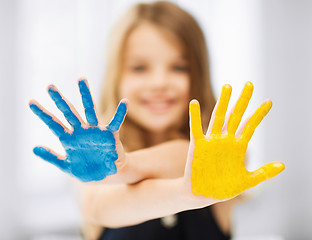 Image showing girl showing painted hands