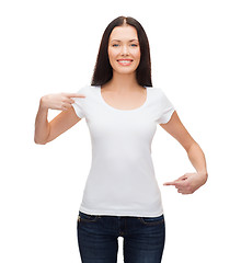 Image showing smiling woman in blank white t-shirt