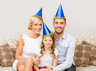 Image showing happy family in hats celebrating