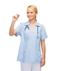 Image showing doctor or nurse working with something imaginary