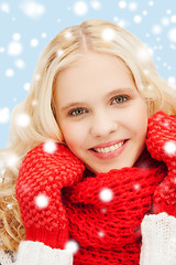 Image showing teenage girl in red mittens and scarf