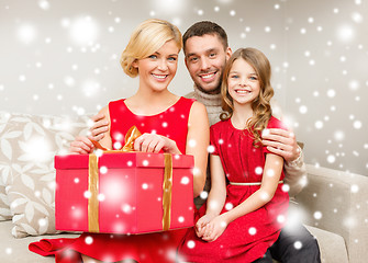 Image showing happy family opening gift box