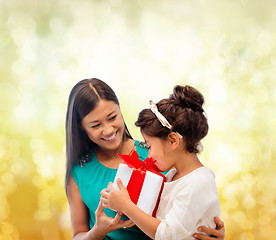 Image showing happy mother and child girl with gift box